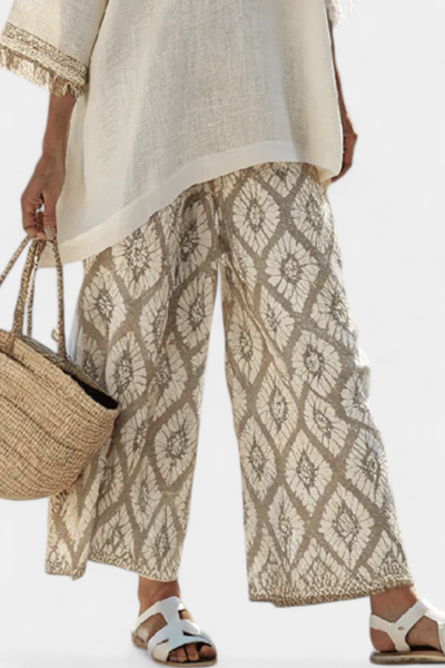 Komplet Boho Chic Daisy: Luźna Bluzka i Spodnie w Geometryczny Wzór dla Unikalnego Stylu